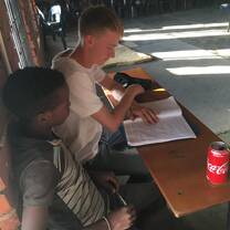 Merlin helping out Tshilidzi on his up coming talk on poaching for a TED-Ed Club - Student Led Talks.