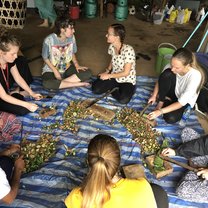 Volenteers making elephant medicine