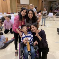 Kaotung, his Grandmom, and physical therapist on our last day of Tykes camp. 