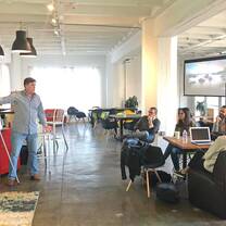 A shot of the class room where the instructor is speaking