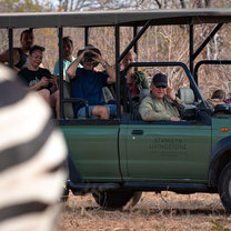 This is a picture a our group watching a heard of zebra checking if they were ok or had been attacked recently 