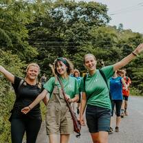 Myself (middle) and two of the other volunteers staying positive during a 10 hour day of walking in blazing Thai heat !