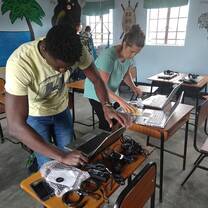 The volunteers setting up the computers