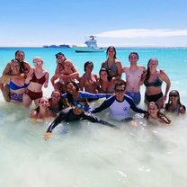 Group picture after diving and snorkeling after Kicker Rock