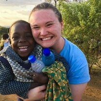 Me with just one of the adorable children we taught, played with and read to. 