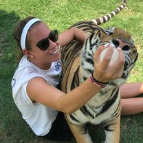 This is from when I was abroad in Thailand and got to feed a tiger cub. 