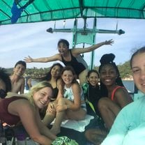 The Wild Tropics family taking a break on the upper deck of the boat between dives