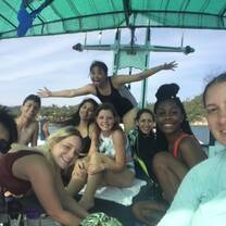 The Wild Tropics family taking a break on the upper deck of the boat between dives