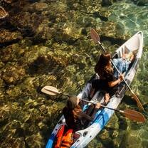Kayaking to do snorkel survey