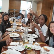 Eating breakfast with my friends.