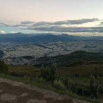 Panoramic view of Quito and volcanoes