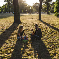 Two interns go on picnics in Parks in Germany.