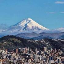 Beautiful landscape with a city and a high volcano
