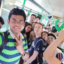 A group of friends on a Melbourne tram.