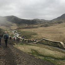 Hiking along the geothermal hot springs. Not only are they great natural hot tubs, hot springs also help produce a large fraction of Iceland's energy.