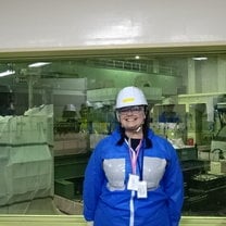 Me, standing in the small control room overlooking the refuel floor of Daini (cried right after this photo because it was so bad-ass)
