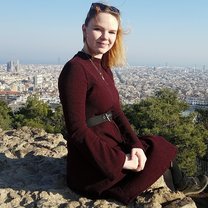 Sitting in Parque Guell, overlooking the city of Barcelona