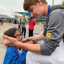 Volunteer with Peruvian child
