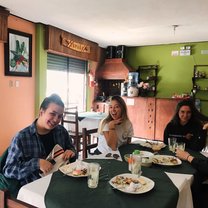4 girls at lunch in banos, ecuador