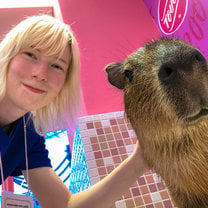 Here I took a selfie of me with a capybara at the Harajuku Kawaii Zoo animal cafe.