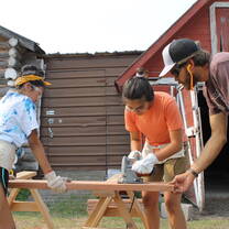 Working on a construction project on the VISIONS Blackfeet program.