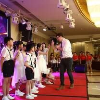 Hosting a talent show for the school