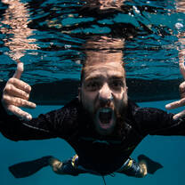 Underwater photo of diver mad about diving