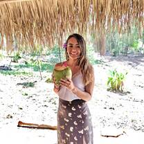 Drinking from a coconut 