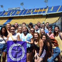 Curry college students enjoying a tour of La Boca Futbol stadium. 
