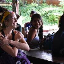 Women laughing at table