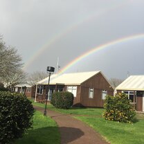 Double rainbow over the Orchard Park Residence cottages