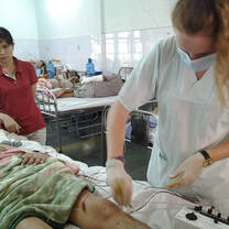 Doctor assisting patient 