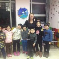 Proud Graduate of The TEFL Academy with Students