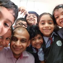 Proud TEFL Graduate with Students Proud TEFL Graduate with Students