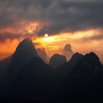 The sun rises over Yangshuo Sunrise over Yangshuo