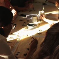 Students practise Chinese calligraphy
