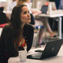 Client representative listens to Fellows' presentation in London - July 2019.