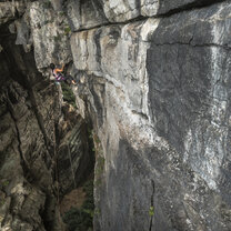 You can climb everywhere in Yangshuo! A climber scales a cave wall