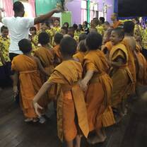 Teaching monks volunteer