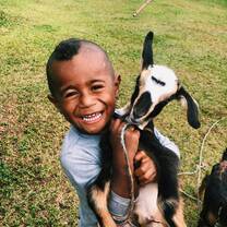Tatchi (My "little brother") and his pet goat 