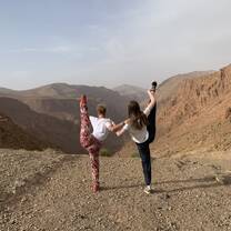 One of my good friends and I posing at the top of a mountain; on a beautiful hike to meet a Nomad family