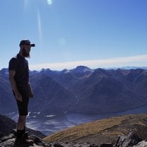 Relaxing at the highest point on Fiordland National Park's Kepler Track
