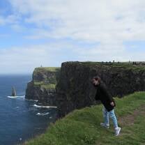 Peer over the edge at the Cliffs of Moher