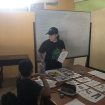 Going over different clothing vocabulary words with my students and playing a matching game on the table with pictures of each item.