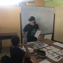 Going over different clothing vocabulary words with my students and playing a matching game on the table with pictures of each item.