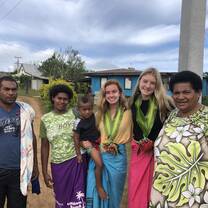 My entire family after our goodbye Kava ceremony with traditional flower leis and face paint. This was extremely sad and we had all been crying before this photo was taken. 