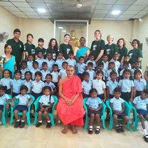 Volunteers with school students