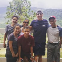 Family Picture This photo is of our host family when we went to a park with them one day to have a nice picnic.