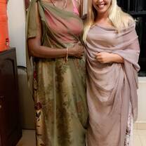 My host mom, Elsie and I wearing traditional Rwandan dresses, umushanana to a gala dinner.