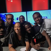 On the television set with a few of the journalists, presenters and crew at Metro TV